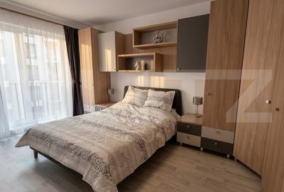 Apartament cu 2 camere semidecomandat, mobilat în Central