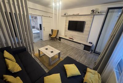 Apartament cu 2 camere semidecomandat, mobilat în Central