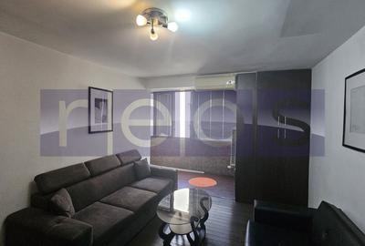 Apartament cu 2 camere semidecomandat, mobilat în Basarab