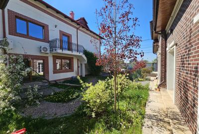 Casă spațioasă de închiriat cu curte amenajată și facilități complete - 1