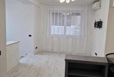 Inchiriere Duplex 5 camere ( Parter +Demisol) in Piata Romana - 11