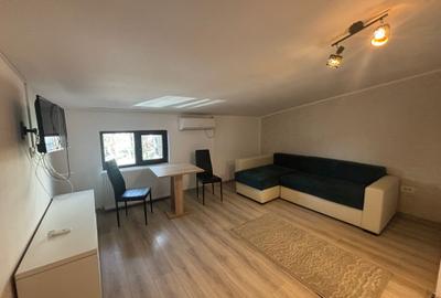 Apartament cu 2 camere semidecomandat, mobilat în Central