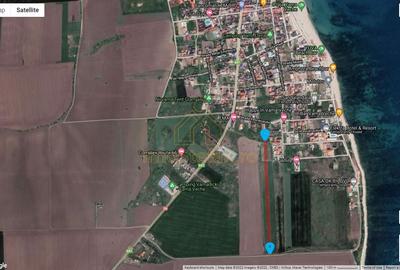 Teren agricol intravilan de 7495 mp, în Est