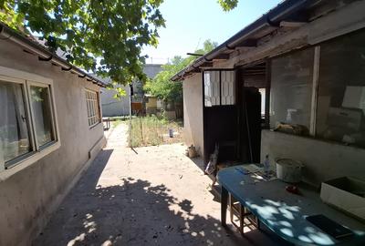 Piata Amzacea-Teren 375 mp (deschidere 14.86 ml )  + casa demolabila - 1