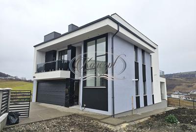 Proprietate moderna cu design exterior deosebit in Popesti - 1