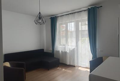 Apartament 2 camere, parter inalt cu curte si loc de parcare