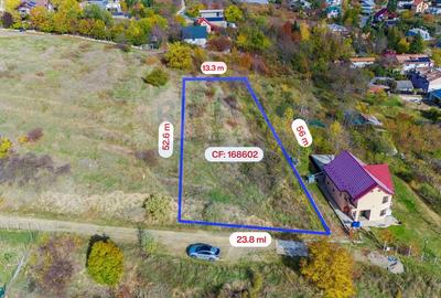 Teren Construcții intravilan de 1000 mp, în Bucium