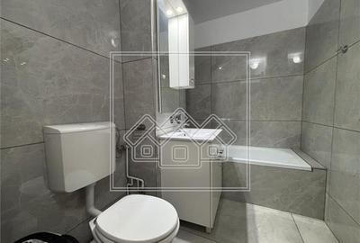 Apartament de vanzare in Sibiu - 3 camere, balcon, pivnita - zona buna - 7