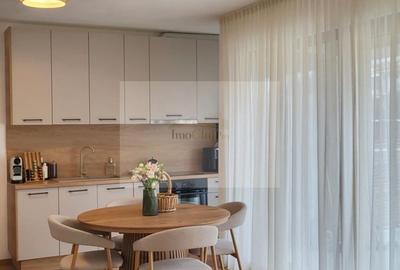 Apartament cu 3 camere semidecomandat, mobilat în Borhanci
