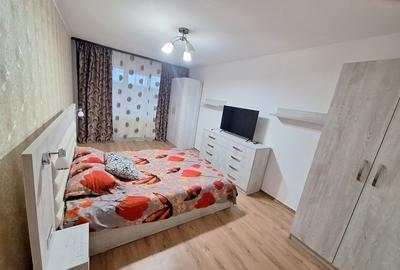 Închiriez apartament spatios cu 2 camere,parter,zona Calea Moldovei,parcare incl - 3