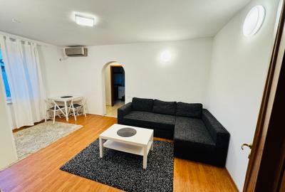 Apartament cu 2 camere semidecomandat, mobilat în 1 Mai