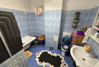 Ap 3 camere - rezultat din alipirea a 2 garsoniere - 62 mp - parter - 10