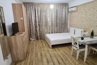 Garsonieră open-space_feminine, mobilată în Bucureștii Noi