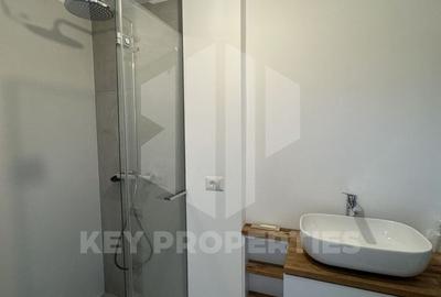 Piata Romana, mansarda boema, finisaje in linii simple si elegante - 10