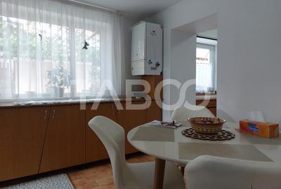 Casa 109 mp 4 camere pivnita terasa loc parcare curte comuna Cisnadie - 12