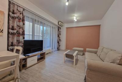 ASE -  Romana - Dorobanti - nou - 2 camere - mobilat modern - centrala termica - 1