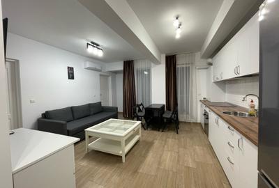 Apartament cu 3 camere semidecomandat, mobilat în Central