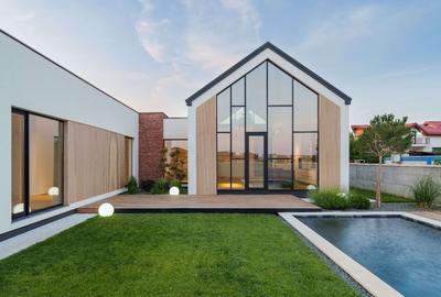 Casă Parter cu Design Minimalist și Piscină - 1