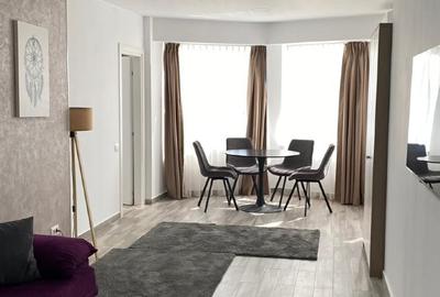 Apartament cu 3 camere semidecomandat, mobilat în Central