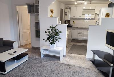 Se inchirieaza casa pe 2 nivele,duplex cu 3 camere,su 95mp,modern mobilat utilat - 1