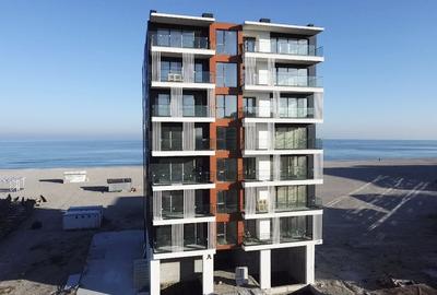 Apartament pe plaja cu vedere la mare in imobil premium - 1