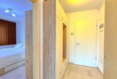 Studio in Kasper Coresi, vedere către aleea pietonală, loc de parcare si boxa - 8