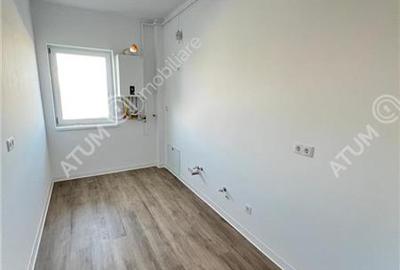Garsoniera cu balcon si parcare de vanzare in Selimbar zona Brana - 4