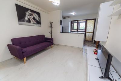 Apartament cu 2 camere semidecomandat, mobilat în Central