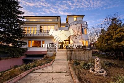 Casă individuală cu arhitectură deosebită și potențial investițional - 1