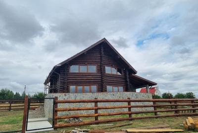 Casa modernizată în 2024 din bușteni de brad - 1