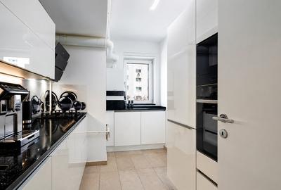 Apartament cu terasa cat o gradina,trei  boxe si doua locuri de parcare subteran - 35