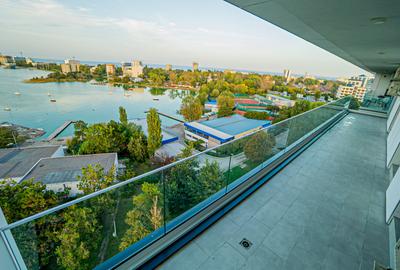 VÂNZARE APARTAMENT 4 CAMERE – VEDERE CĂTRE LAC-LOC DE PARCARE - 1