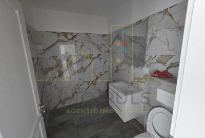 Apartament la parter cu balcon. Bucatarie separata. Loc de parcare - 4