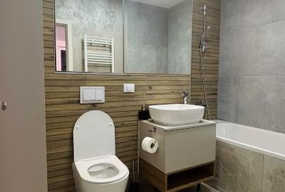 Apartament cu 3 camere decomandat, mobilat în Tractorul