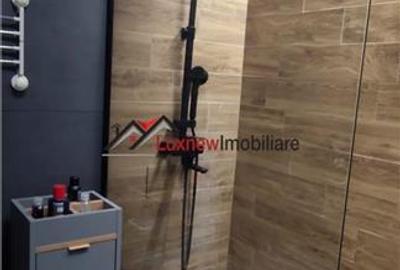 Apartament cu 2 camere, mobilat 45,6 mp utili plus balcon, garaj subteran zona T - 10