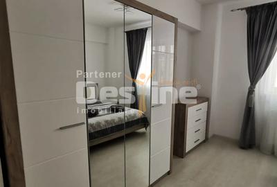 Apartament cu 2 camere 50 mp,  cu loc  de  parcare  inclus,  situat in Tractorul - 4