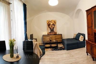 Apartament cu 2 camere semidecomandat, mobilat în Central