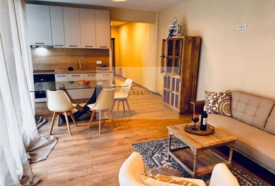 Apartament cu 3 camere semidecomandat, mobilat în Borhanci