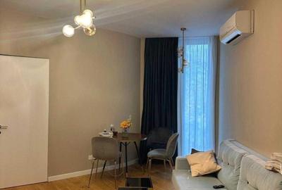 Apartament cu 2 camere semidecomandat, mobilat în P-ța Victoriei