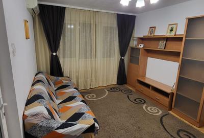 Apartament cu 2 camere semidecomandat, mobilat în Podu Roș