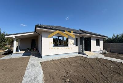 -Casa individuală -4 camere -2 băi - - 2