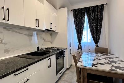 2 Camere - Bucatarie Inchisa - 2 Parcari - 9