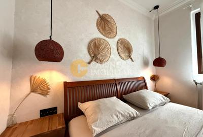 Apartament cu 2 camere semidecomandat, mobilat în Podu Roș