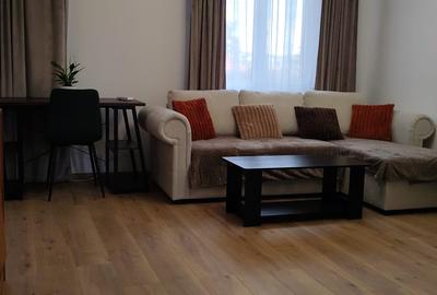 Apartament cu 2 camere semidecomandat, mobilat în Central