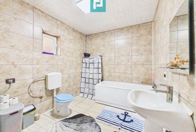 Casă P+E cu două apartamente, zona Drăgășani - 7