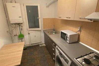 Apartament cu 2 camere semidecomandat, mobilat în Podu Roș