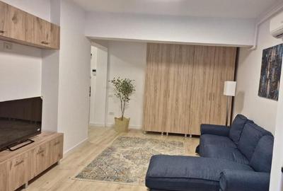 Apartament cu 2 camere semidecomandat, mobilat în Central