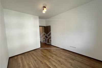Apartament cu 3 camere, 56,6 mp utili, balcon de 7 mp - Calea Cisnadiei - 13