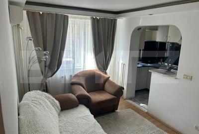 Apartament cu 3 camere semidecomandat, mobilat în Podu Roș