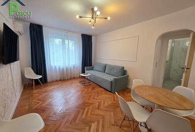 Apartament cu 3 camere semidecomandat în P-ța Romană